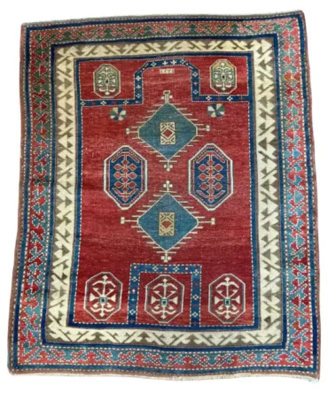 Antique Fachralo Kazak Rug